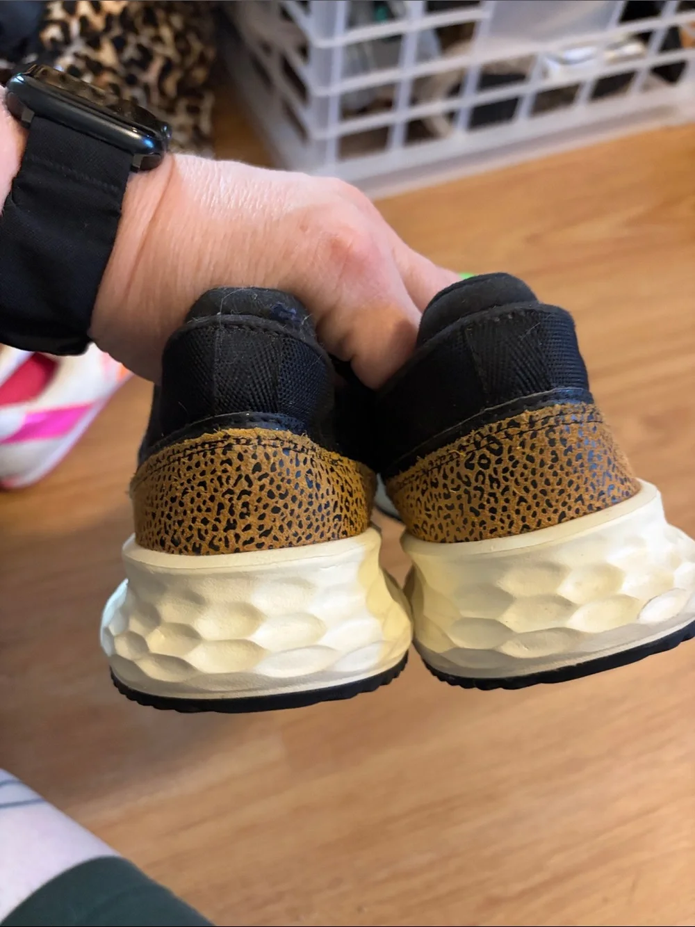 New Balance women’s Black and Tan Leopard-Print Sneakers